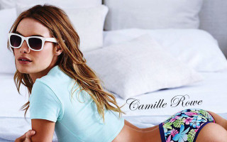 Woman blue shirt floral shorts - camille souter free wallpaper