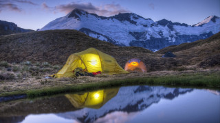Yellow tent lake mountains night - a mountain range in the background free wallpaper