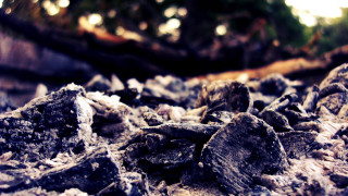 Rocky dirt pile city lights - primitivism free wallpaper