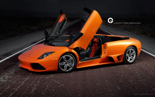 Orange sports car desert night - a dark sky free wallpaper