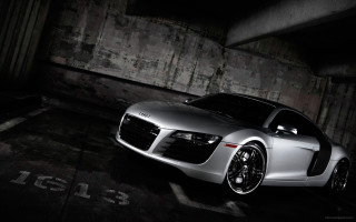 Silver sports car night parking 2 - a concrete wall free wallpaper