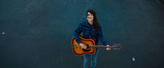 Woman holding guitar blue black - adrienn henczné deák free wallpaper