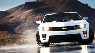White car wet road mountains 2 - a splash of water free wallpaper