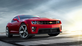 Red chevrolet camaro driving road - a road free wallpaper for desktop