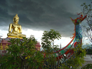 Buddha statue wooden bridge river - stormy weather free wallpaper