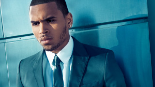 Man suit leaning wall black - christopher perkins free wallpaper