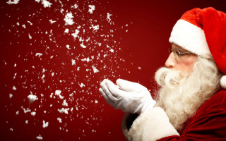 Santa claus blowing snow hands - closed free wallpaper