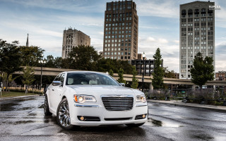 White car parking lot tall - the city free wallpaper