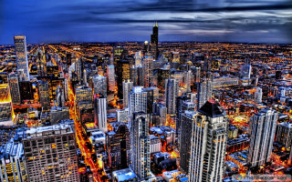 Cityscape tall buildings cloudy sky - a cloudy sky in the background free wallpaper