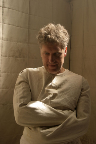 Man white shirt crossed arms - private press free wallpaper