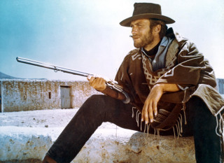Man sitting wall gun hat - a wall free wallpaper