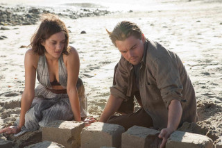 Man woman playing sand beach 2 - the beach together free wallpaper