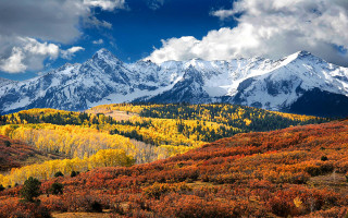 Mountain range snow capped autumn - a matte painting free wallpaper