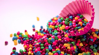 Colorful candy sprinkles white surface 3 - full free wallpaper