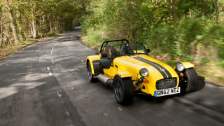 Yellow car driving road forest 2 - a road next free wallpaper