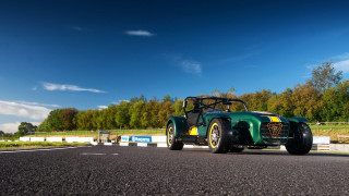 Green yellow car driving road - a road next free wallpaper