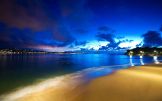 Beach night water clouds lights 2 - a beach free wallpaper for desktop
