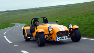Yellow car driving road person - a yellow car free wallpaper