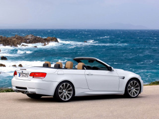 White convertible car ocean view - the side of the road near the ocean free wallpaper