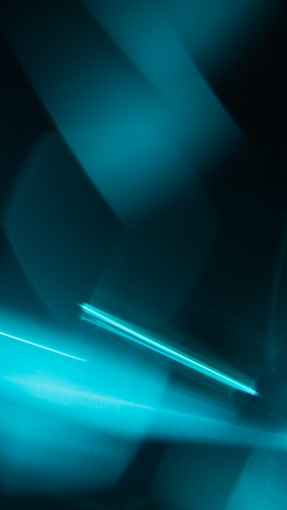 Blurry blue light dark room - anamorphic free wallpaper
