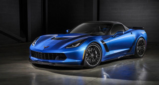 Blue sports car garage black 2 - a black wall behind free wallpaper