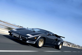 Black sports car road tall - a tall building free wallpaper