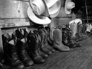 Cowboy boots hats hanging wall - western free wallpaper