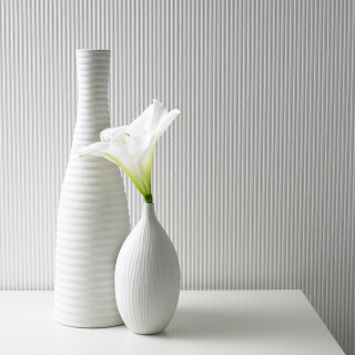 Two white vases single flower - a table top free wallpaper