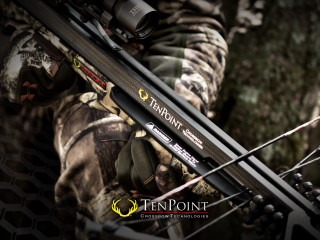 Man holding bow hunting outfit - product photo free wallpaper