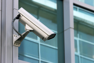 Security camera building windows glass - the side of a building free wallpaper