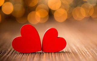Red hearts wooden table blurry - two red heart free wallpaper