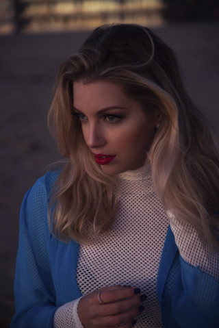 Woman long hair blue jacket - her chest free wallpaper