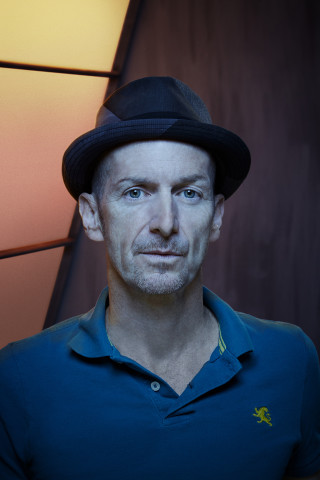 Man hat blue shirt wall - a wall free wallpaper