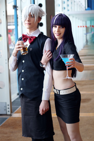Costume party couple holding drinks - a man and a woman free wallpaper