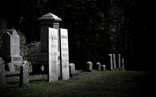 Cemetery headstones clock night trees - a cemetery free wallpaper