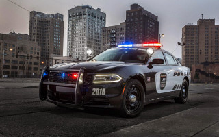 Police car parking lot city - a parking lot free wallpaper