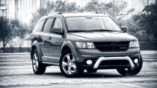 Dodge suv parking lot trees - the background and a building in the background free wallpaper