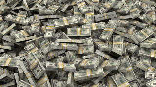 Money pile table cityscape bridge - top of a table next free wallpaper