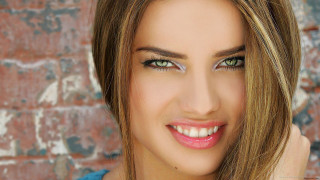 Woman green eyes brick wall - realistic eye free wallpaper