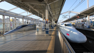 White train parked station platform - a train free wallpaper