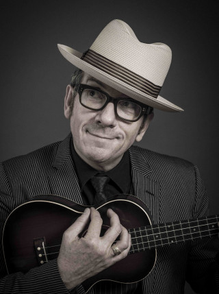 Man suit hat guitar smiling - private press free wallpaper
