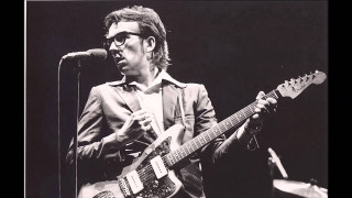 Man playing guitar microphone stand 4 - a guitar in front free wallpaper