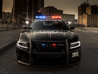 Police car parked lights on - intimidating free wallpaper