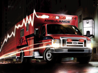 Red ambulance truck night street - action scene free wallpaper