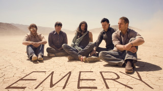 Men sitting ground emery written - a group of men free wallpaper