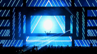 Stage large screen person hands - epsylon point free wallpaper
