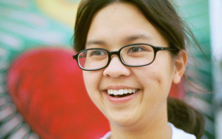 Woman glasses smiling heart wall - glass free wallpaper