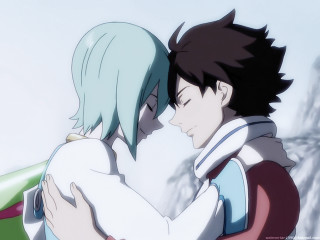 Couple hugging snowy background trees - free love wallpaper