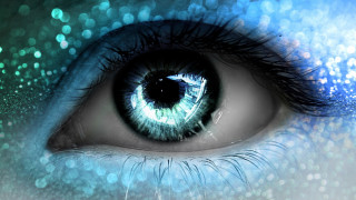 Blue eye closeup blurry background - realistic eye free wallpaper