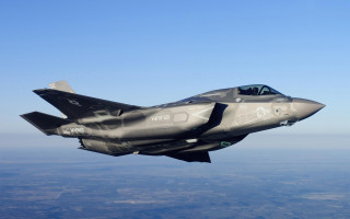 Jet flying sky background blue - 100mm free wallpaper
